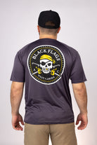 Rear view of Graphite West Florida Black Flags Performance Tee