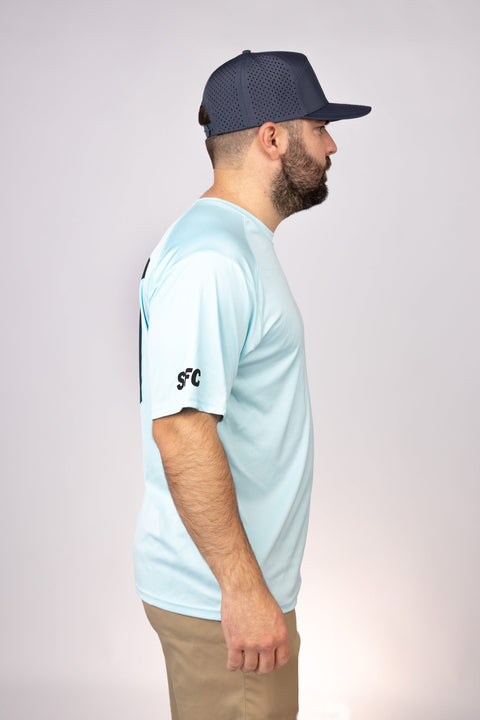 Side view of Aqua Blue New York Granders Performance Tee