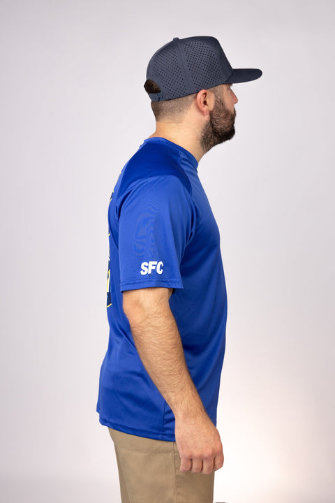 Side view of Royal South Carolina Outcast Performance Tee