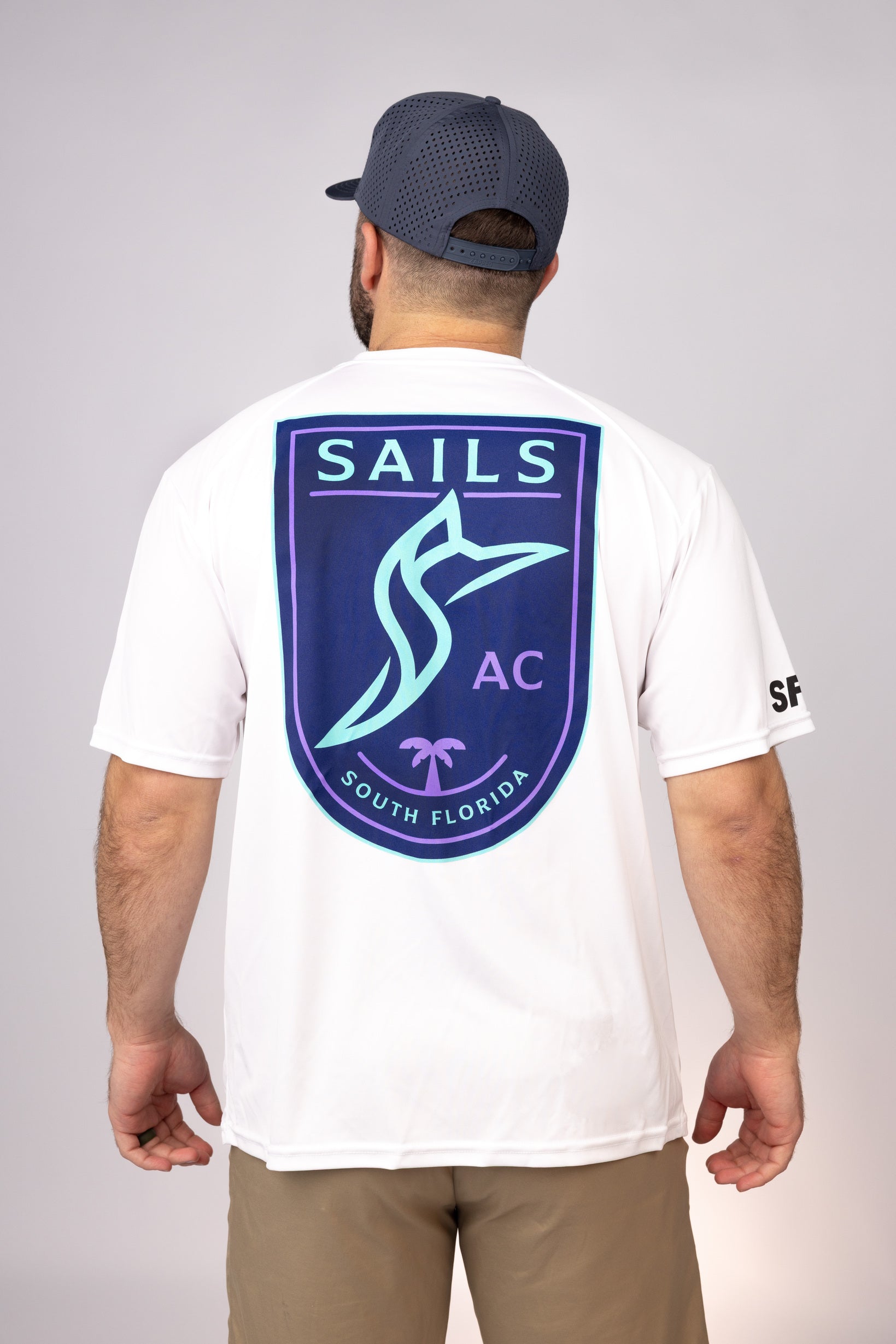 Rear view of White South Florida Sails Performance Tee