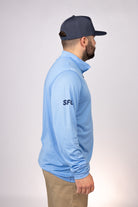 Side view of Columbia Blue Gulf Coast Cowboys Quarter Zip