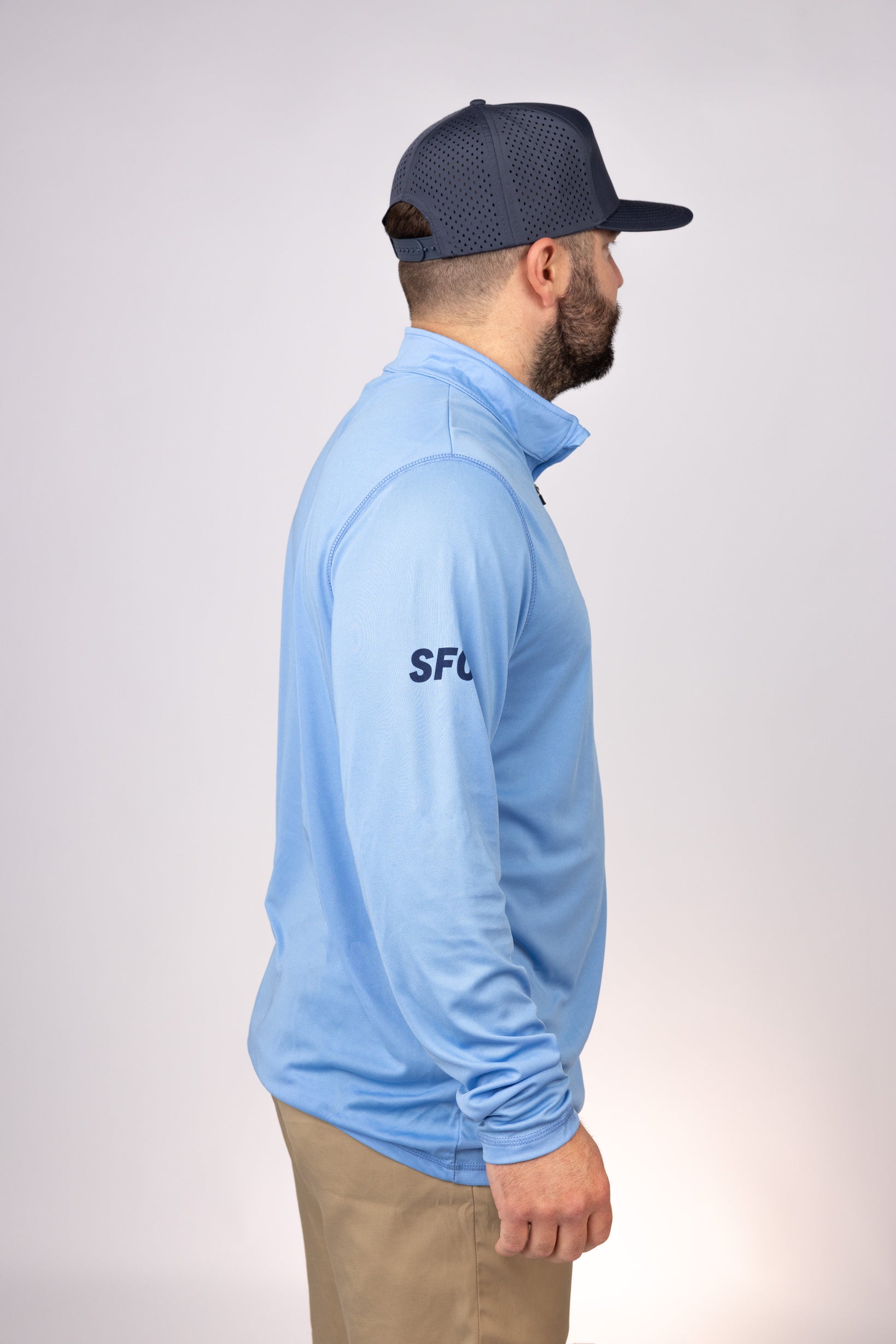 Side view of Columbia Blue Gulf Coast Cowboys Quarter Zip