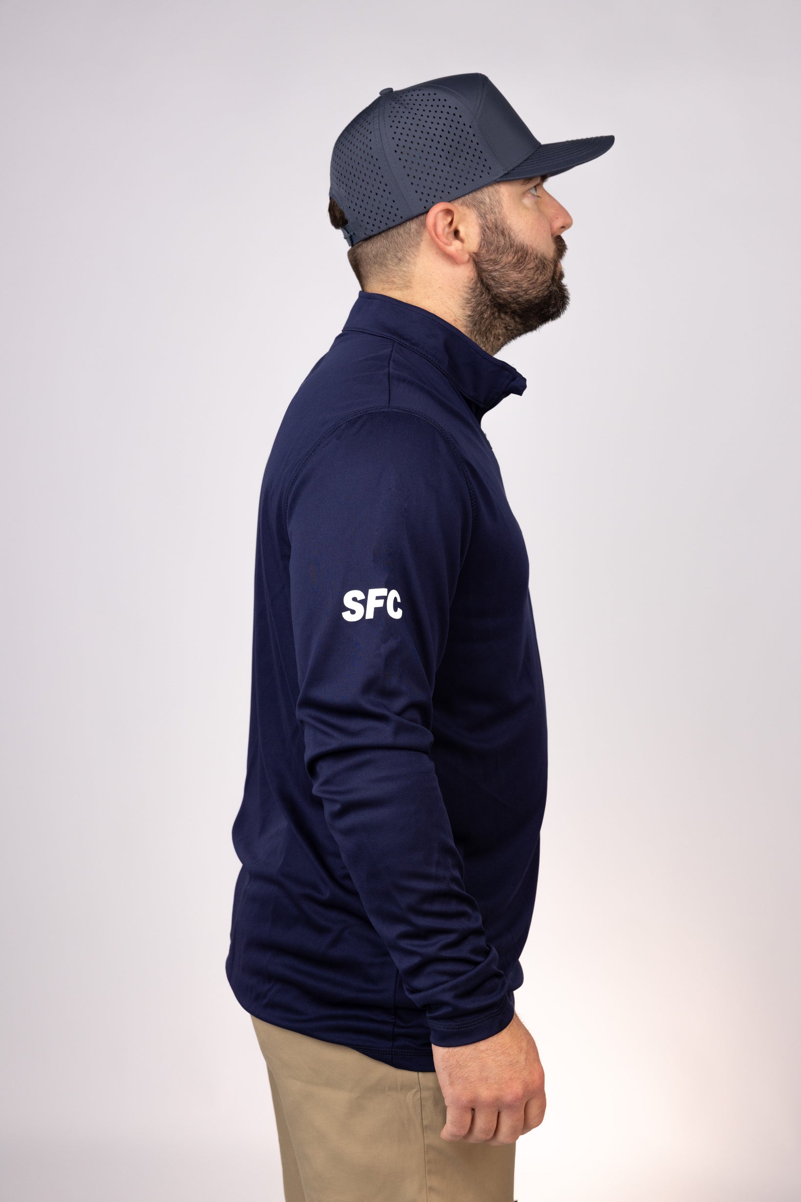 Side view of Navy South Carolina Outcast Quarter Zip